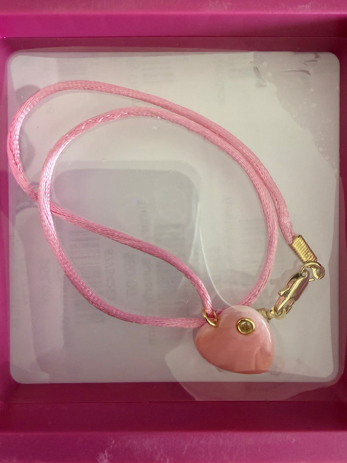 Carved Gem Stone on corded necklace