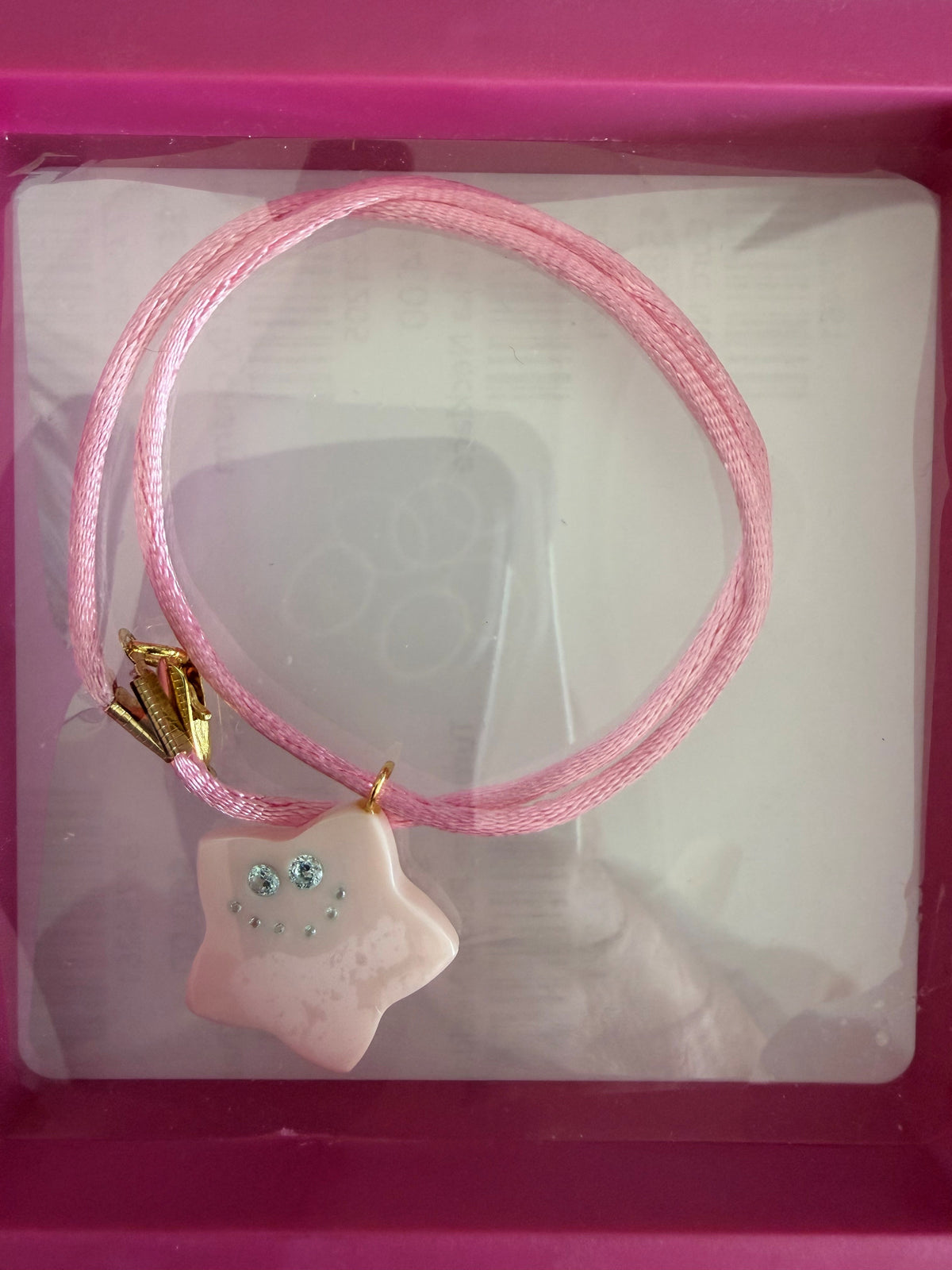Carved Gem Stone on corded necklace